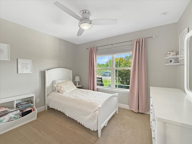 2055 Bright Water Dr, Gulf Breeze, FL 32563 - bedroom featuring light carpet, baseboards, and ceiling fan