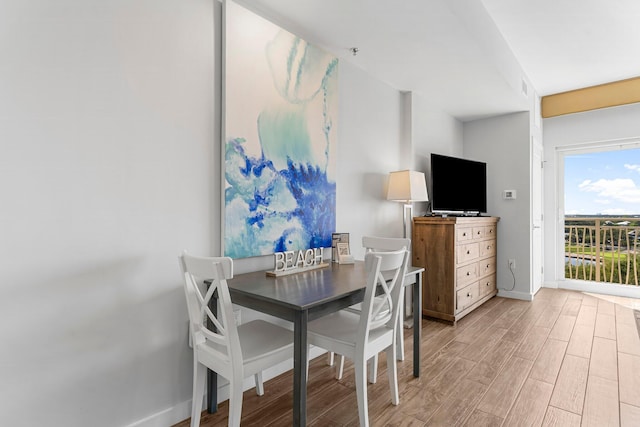 5000 S Sandestin Blvd Unit 6806, Sandestin, FL 32550 - dining space with light wood finished floors and baseboards