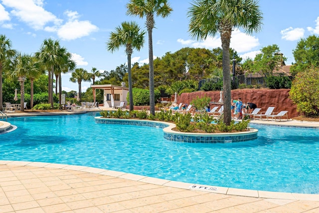 5000 S Sandestin Blvd Unit 6806, Sandestin, FL 32550 - community pool with a patio area