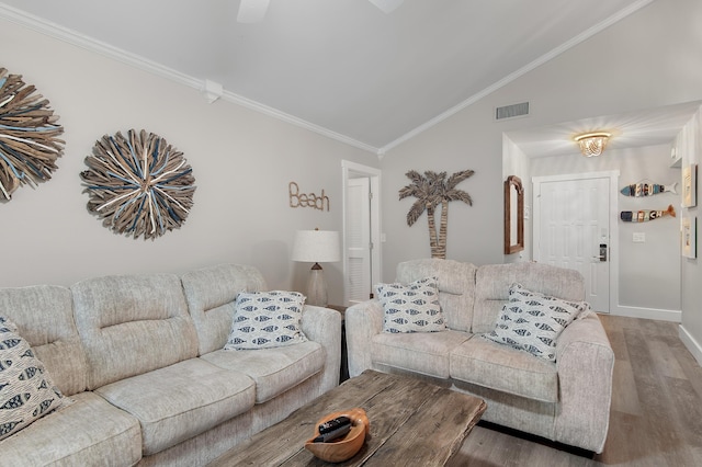 496 Linkside Dr, Miramar Beach, FL 32550 - living room with baseboards, vaulted ceiling, crown molding, visible vents, and wood finished floors