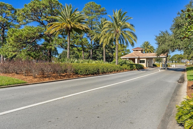 496 Linkside Dr, Miramar Beach, FL 32550 - view of road featuring a gated entry and curbs