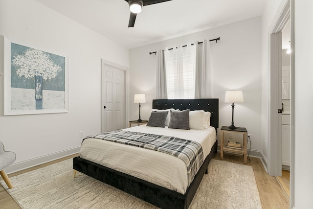 332 Somerset Bridge Rd, Santa Rosa Beach, FL 32459 - bedroom featuring baseboards, light wood-type flooring, and a ceiling fan