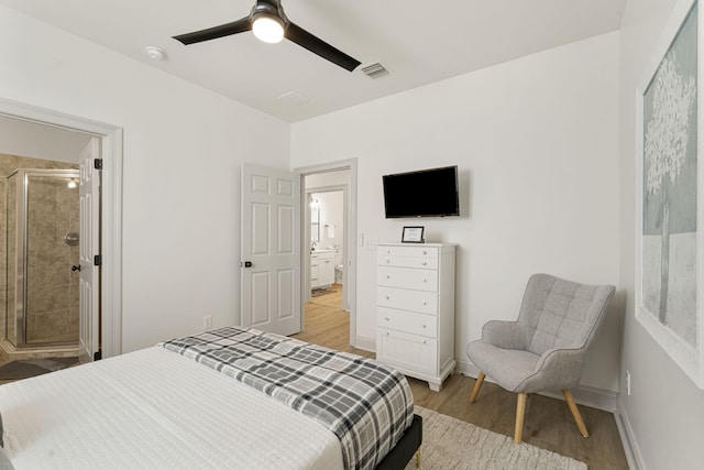 332 Somerset Bridge Rd, Santa Rosa Beach, FL 32459 - bedroom with ensuite bath, visible vents, a ceiling fan, and light wood-style flooring