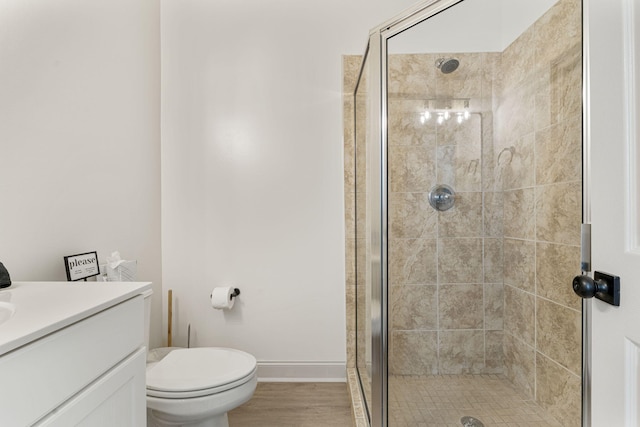 332 Somerset Bridge Rd, Santa Rosa Beach, FL 32459 - bathroom with toilet, a shower stall, vanity, and baseboards