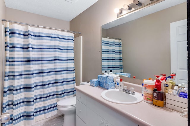 322 Apple Dr, Crestview, FL 32536 - bathroom with a textured ceiling, vanity, toilet, marble finish floor, and a shower with shower curtain