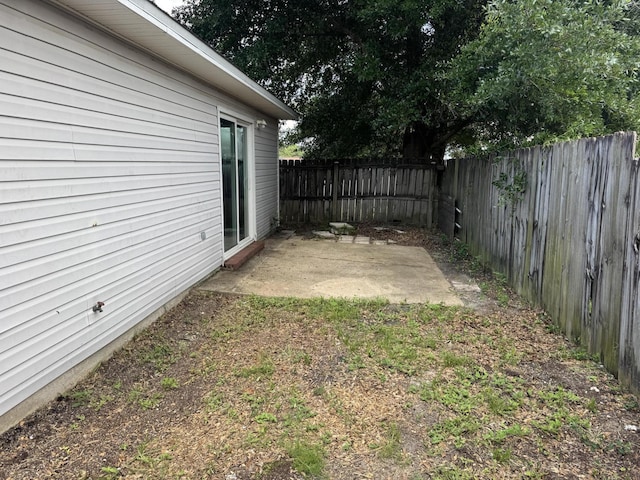 322 Apple Dr, Crestview, FL 32536 - fenced backyard featuring a patio