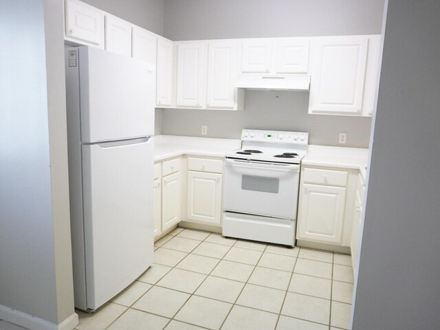 kitchen with under cabinet range hood, white cabinetry, and white appliances