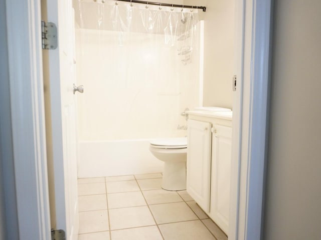 full bath with vanity, toilet, shower / bath combination with curtain, and tile patterned floors