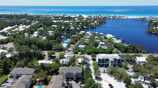 birds eye view of property featuring a water view and a residential view
