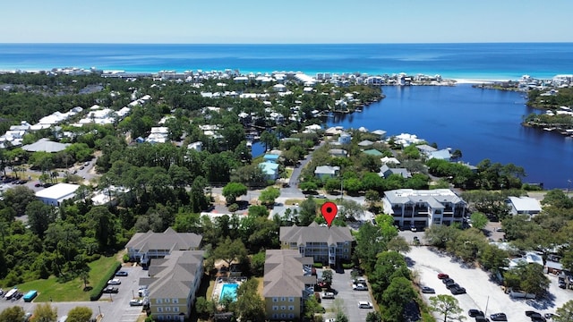bird's eye view with a water view and a residential view