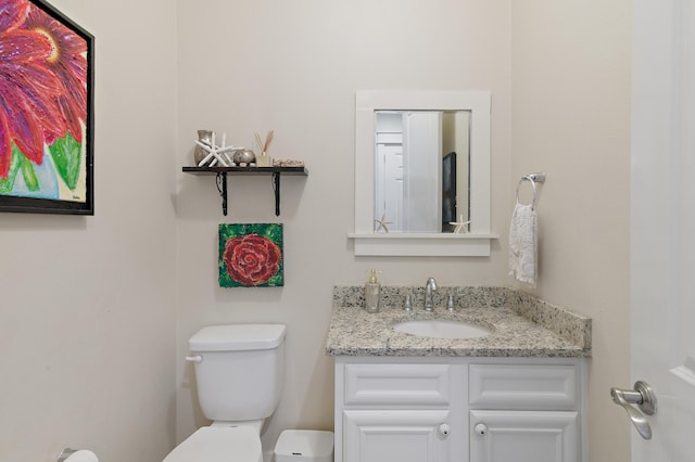 half bath with toilet and vanity