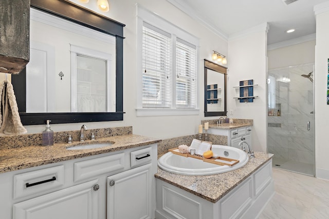 bathroom featuring a stall shower, crown molding, marble finish flooring, a bath, and two vanities