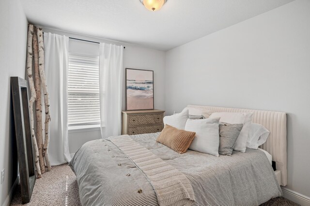 bedroom featuring baseboards
