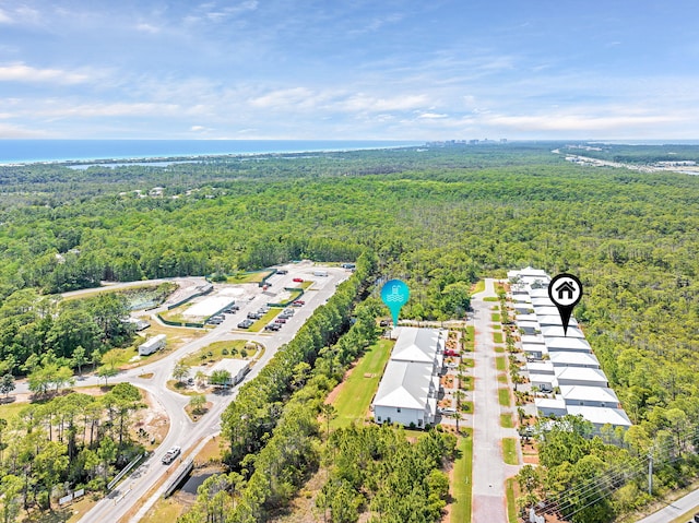 birds eye view of property with a wooded view