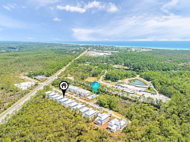 bird's eye view featuring a forest view