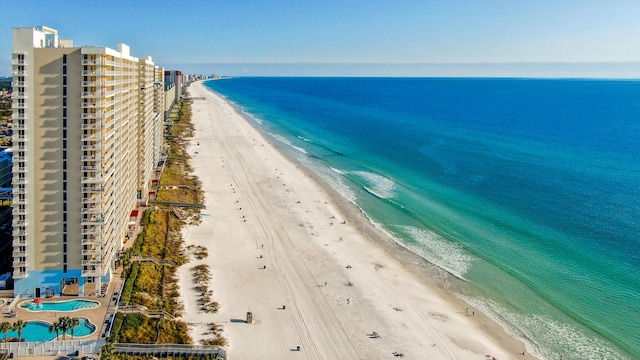 aerial view with a view of the beach and a water view