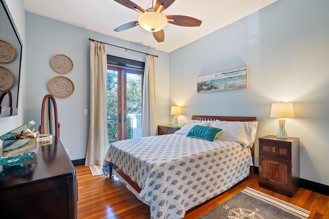 100 Vista Blfs, Destin, FL 32541 - bedroom with access to outside, baseboards, a ceiling fan, and wood finished floors