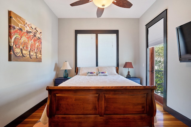 100 Vista Blfs, Destin, FL 32541 - bedroom featuring access to exterior, wood finished floors, baseboards, and a ceiling fan
