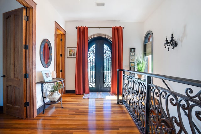 100 Vista Blfs, Destin, FL 32541 - foyer entrance with french doors, wood finished floors, and visible vents
