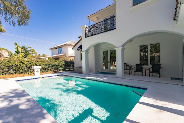 100 Vista Blfs, Destin, FL 32541 - view of pool featuring a fenced in pool, a patio, and french doors
