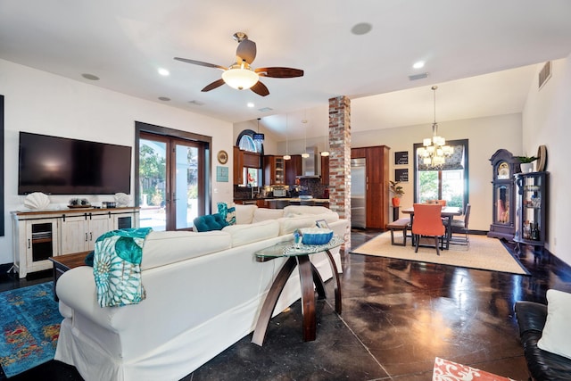 100 Vista Blfs, Destin, FL 32541 - living room with finished concrete floors, ceiling fan with notable chandelier, visible vents, and recessed lighting