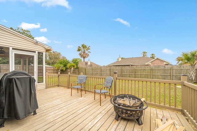 119 Long Pointe Dr, Mary Esther, FL 32569 - deck with an outdoor fire pit and a fenced backyard
