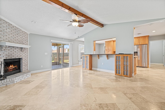 119 Long Pointe Dr, Mary Esther, FL 32569 - unfurnished living room with a ceiling fan, a fireplace, and a textured ceiling