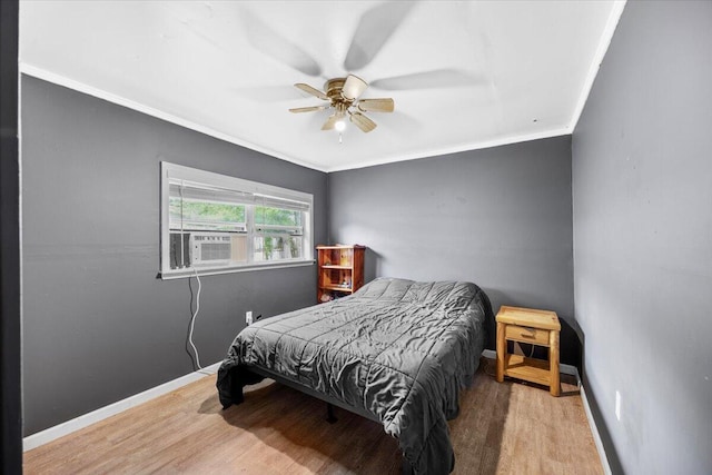 706 Mary Ave, Fort Walton Beach, FL 32547 - bedroom featuring wood finished floors, crown molding, and baseboards