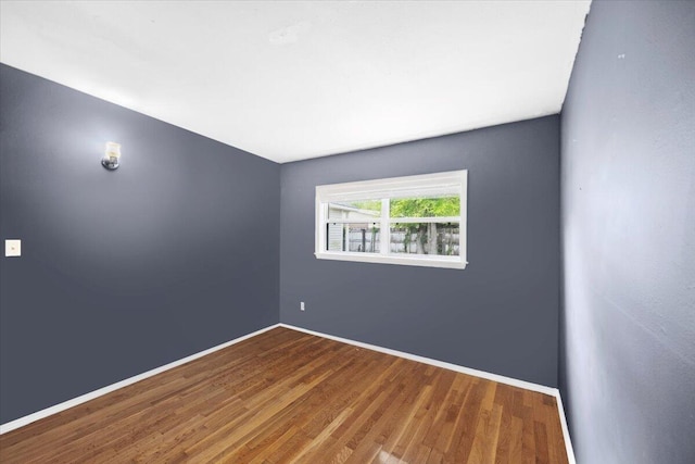 706 Mary Ave, Fort Walton Beach, FL 32547 - empty room featuring wood finished floors and baseboards