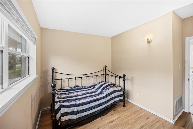 706 Mary Ave, Fort Walton Beach, FL 32547 - bedroom featuring wood finished floors, visible vents, and baseboards
