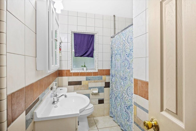706 Mary Ave, Fort Walton Beach, FL 32547 - full bathroom with toilet, curtained shower, tile walls, and vanity