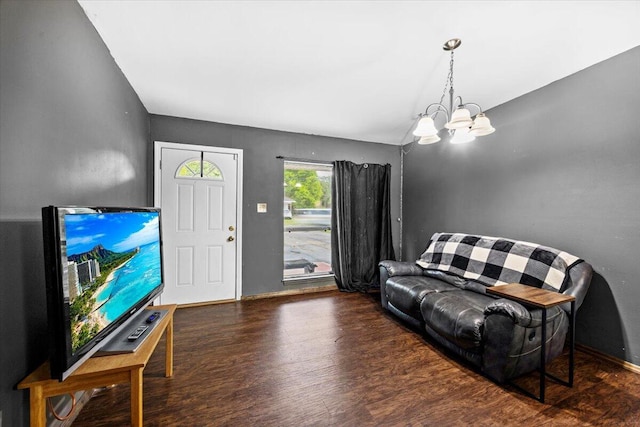 706 Mary Ave, Fort Walton Beach, FL 32547 - living area with wood finished floors, a notable chandelier, and baseboards