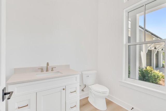 63 W Firethorn Cir Lot 65, Watersound, FL 32461 - half bath featuring vanity and wood finished floors