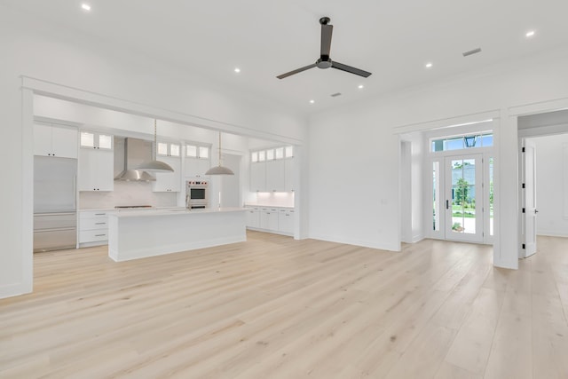 63 W Firethorn Cir Lot 65, Watersound, FL 32461 - unfurnished living room featuring a ceiling fan, light wood finished floors, and recessed lighting
