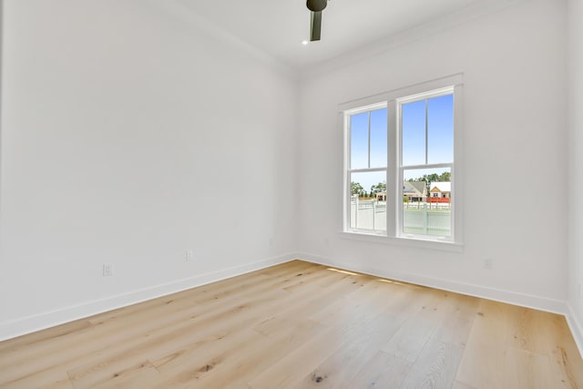63 W Firethorn Cir Lot 65, Watersound, FL 32461 - unfurnished room with wood finished floors and ornamental molding