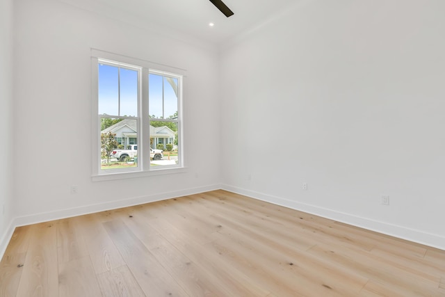 63 W Firethorn Cir Lot 65, Watersound, FL 32461 - unfurnished room with light wood-style flooring and baseboards