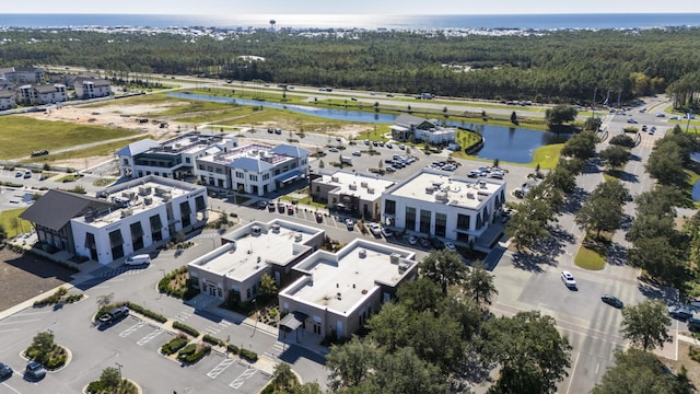 63 W Firethorn Cir Lot 65, Watersound, FL 32461 - bird's eye view of a nearby body of water and a forest