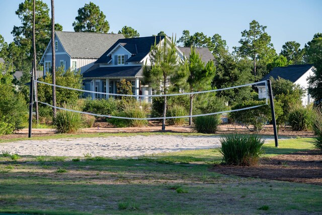 63 W Firethorn Cir Lot 65, Watersound, FL 32461 - view of community with volleyball court and a yard