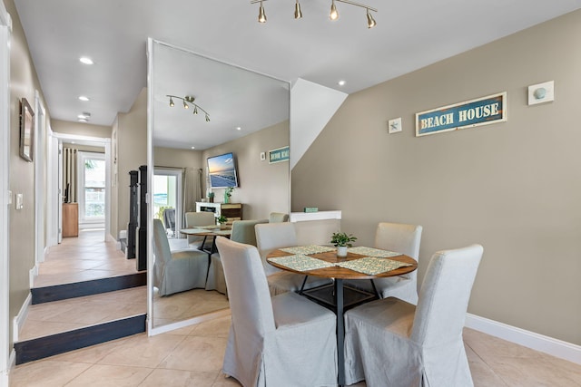 dining room featuring baseboards, recessed lighting, and light tile patterned flooring