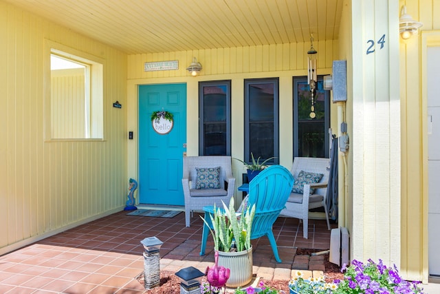 doorway to property with covered porch
