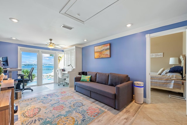living room featuring crown molding, visible vents, attic access, ceiling fan, and recessed lighting