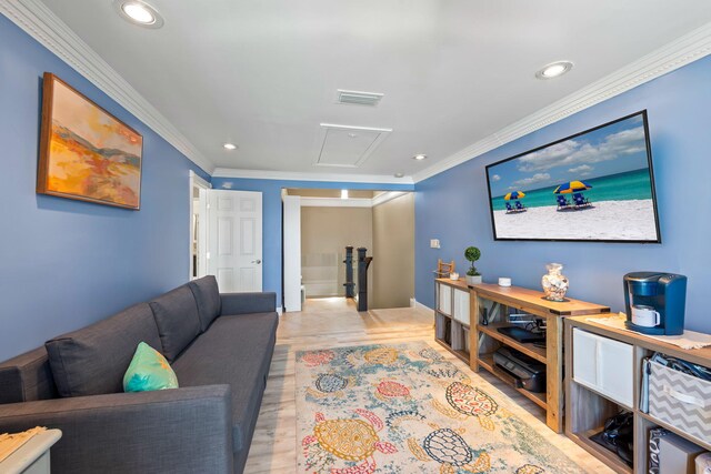 living area featuring ornamental molding, recessed lighting, and visible vents