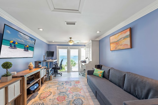 living area with ceiling fan, recessed lighting, wood finished floors, visible vents, and ornamental molding