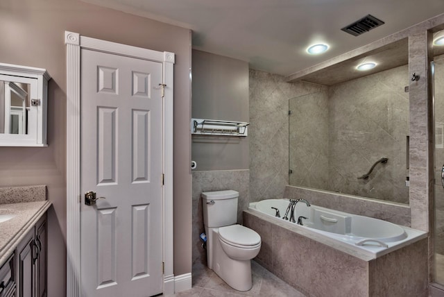 bathroom featuring vanity, toilet, visible vents, tiled shower, and a bath
