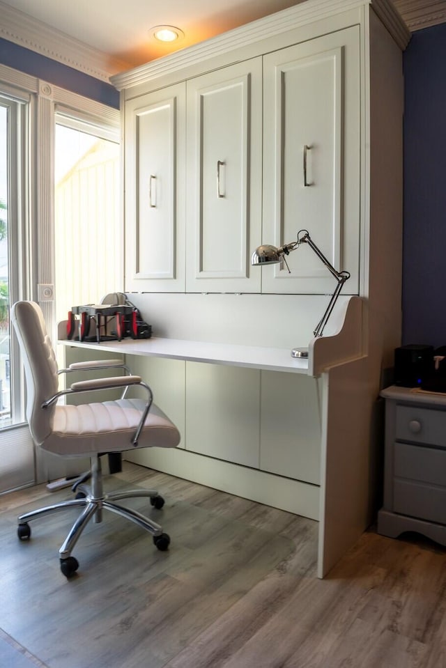 home office featuring recessed lighting, crown molding, and wood finished floors