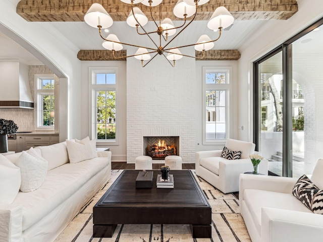 335 Churchill Oaks Dr, Santa Rosa Beach, FL 32459 - living area with arched walkways and a fireplace
