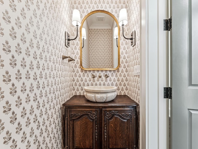 335 Churchill Oaks Dr, Santa Rosa Beach, FL 32459 - bathroom featuring wallpapered walls and vanity