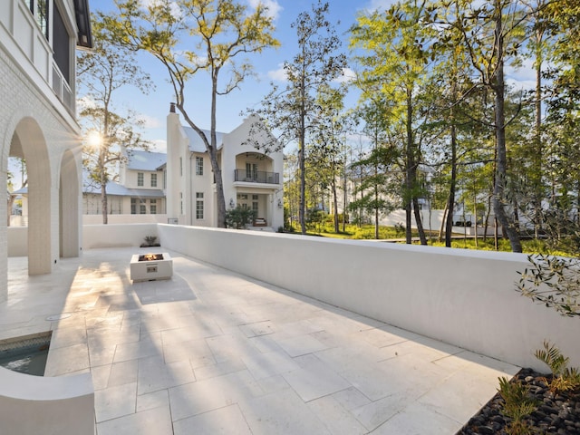 335 Churchill Oaks Dr, Santa Rosa Beach, FL 32459 - view of patio / terrace with an outdoor fire pit