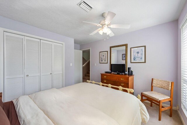 8520 Gulf Blvd # Ut-39, Navarre, FL 32566 - bedroom featuring a closet, light carpet, and a ceiling fan
