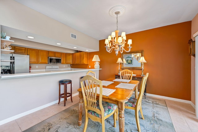 8520 Gulf Blvd # Ut-39, Navarre, FL 32566 - dining area with a chandelier, light tile patterned floors, baseboards, and recessed lighting